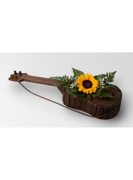 Κιθάρα καθιστή με σύνθεση λουλουδιών